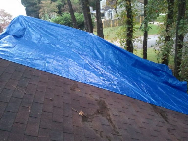 Decoding the process of attaching blue tarp to a leaking roof Home Chunk