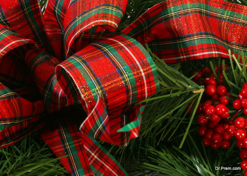 Hang a wreath with some plaid ribbons